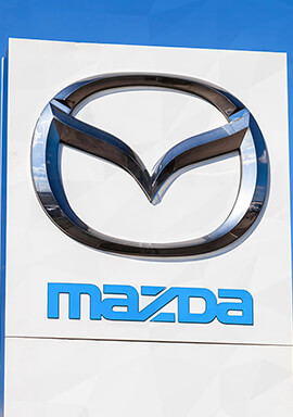 Mazda3 Lawsuit Alleges Window Stickers of Certain 2025 Vehicles Misrepresented Sound System, Radio Features